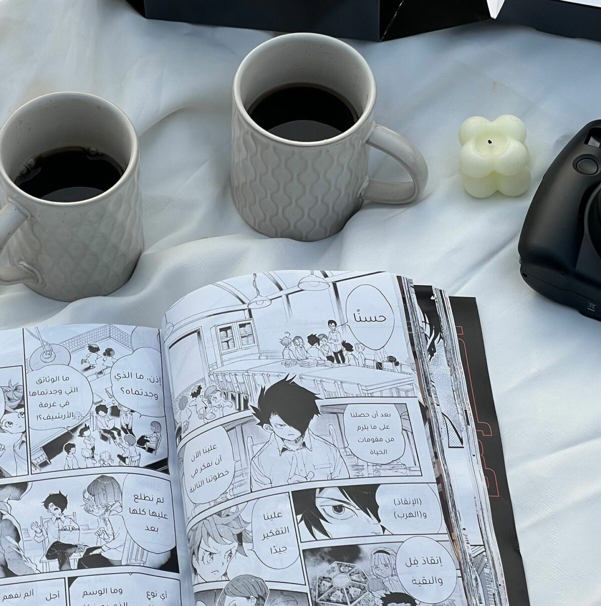 Enjoy a peaceful picnic with cake, coffee, and manga amidst nature's embrace.